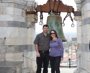 At the top of the sloping tower