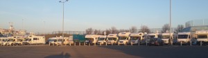 Spot Cuthbert in this identity parade of camper-vans parked-up in Calais!