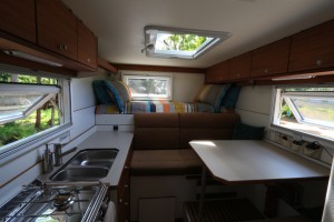 camper truck interior looking to bed stowed