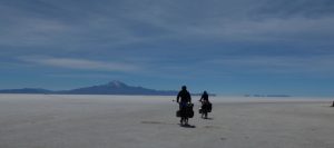 Cyclists on Salar de Uyuni Bolivia