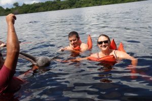 swimming with pink dolphins